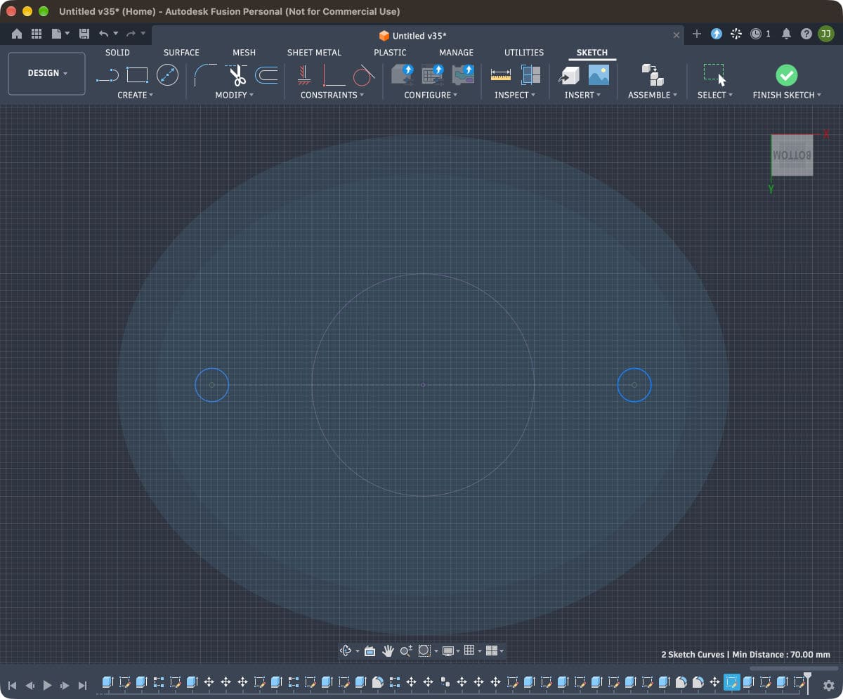 Autodesk Fusion in sketch mode showing two small locating circles 70 mm apart on either side of a central bore, drawn by Copilot.